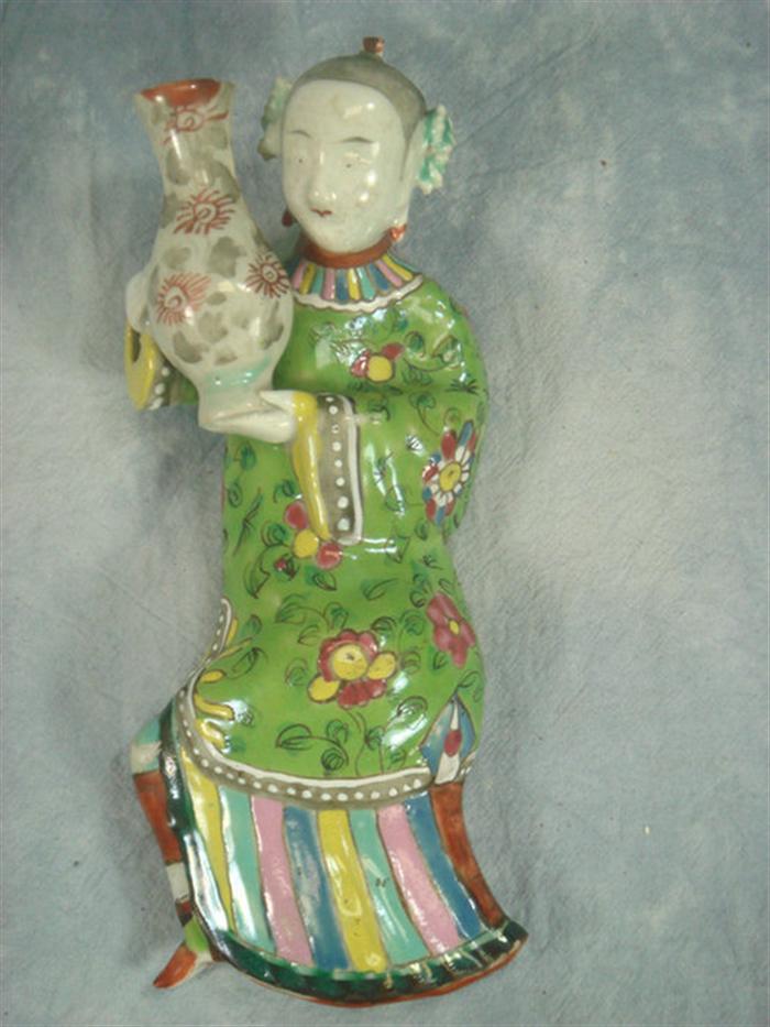 Appraisal: Chinese porcelain wall figure in green robe with floral decoration