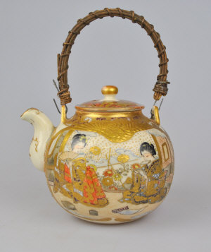 Appraisal: Japanese Satsuma globular teapot and cover decorated with ladies at