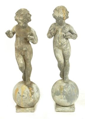 Appraisal: A pair of lead figures modelled as a boy and