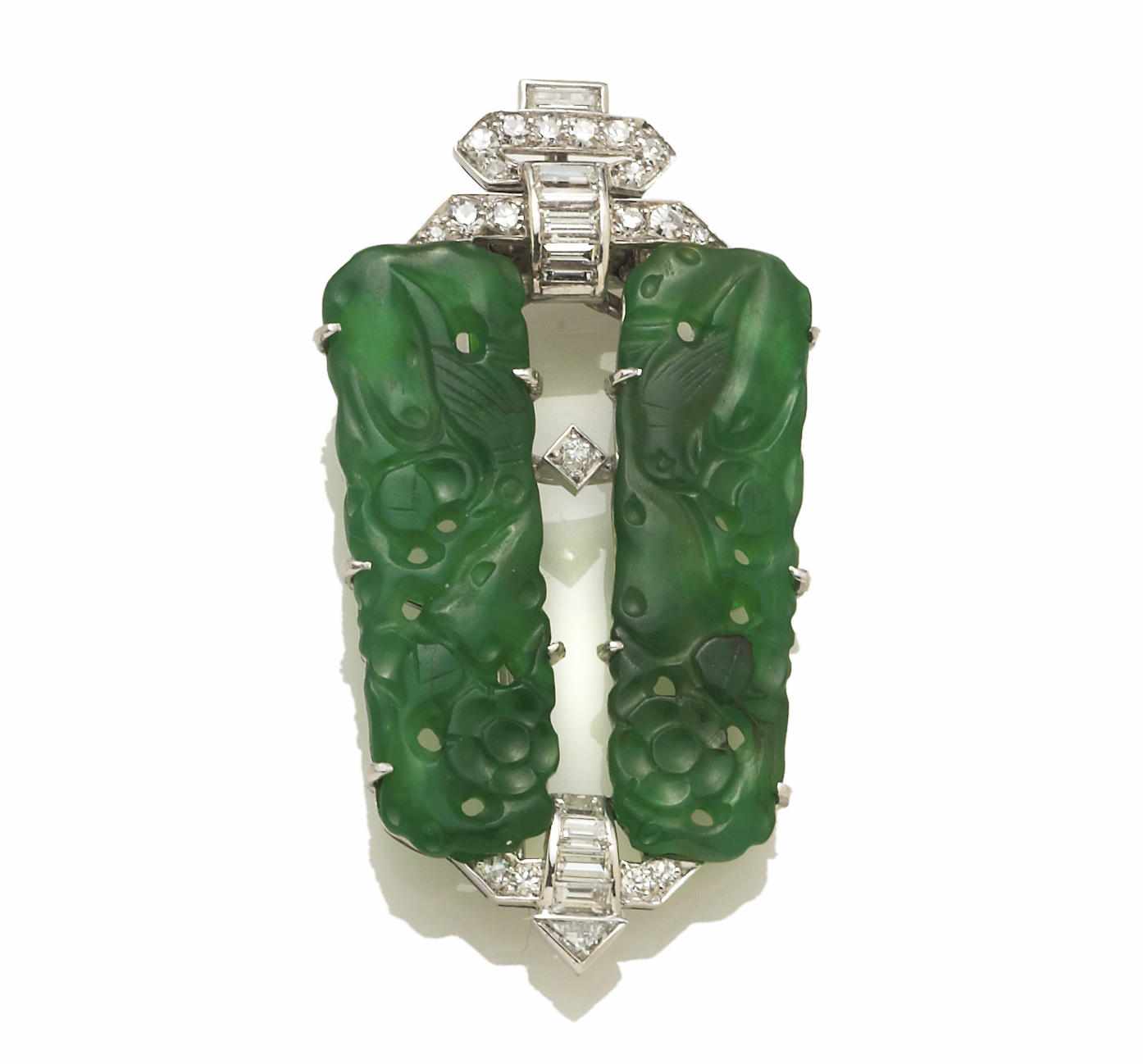 Appraisal: A jadeite jade and diamond clip brooch mounted in fourteen