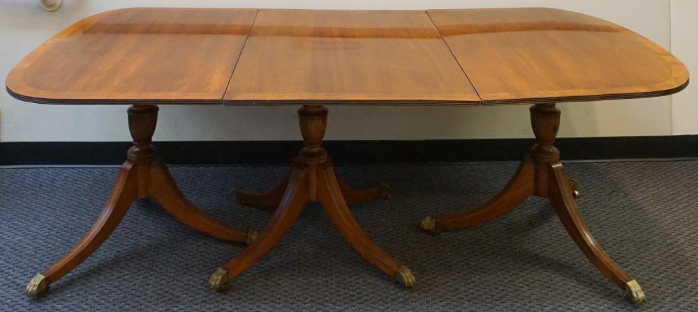 Appraisal: Regency Style Mahogany Three-Pedestal Dining Table x x in x