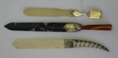 Appraisal: A PAPER KNIFE maker J C S Birmingham with striped