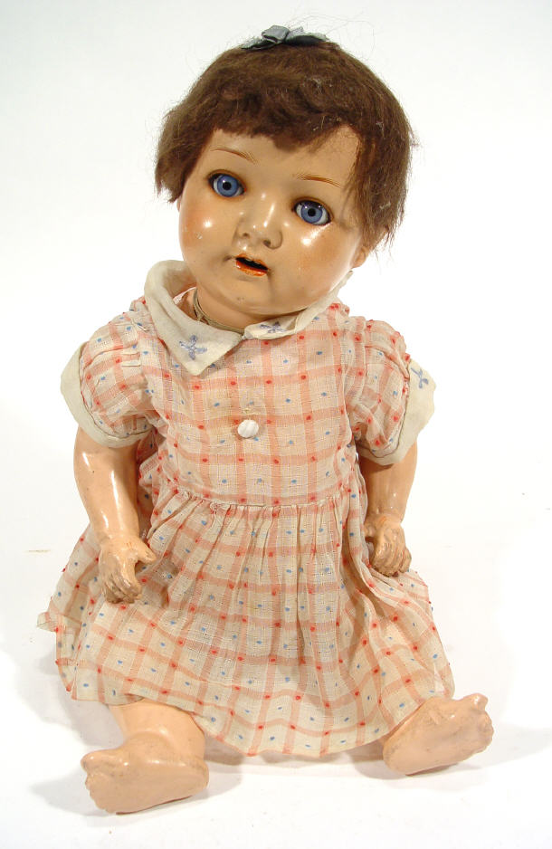 Appraisal: German bisque headed doll with open and close glass eyes