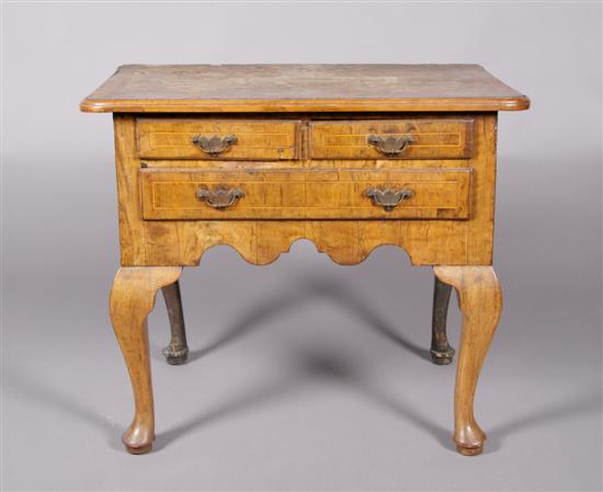 Appraisal: A Queen Anne Style Walnut Lowboy Height x width x