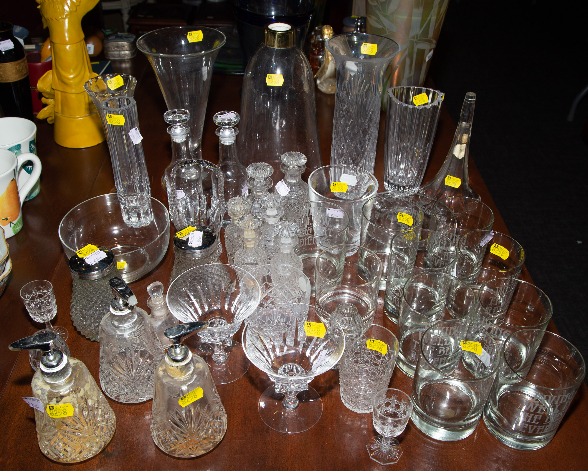 Appraisal: ASSORTED GLASSWARE Includes group of crystal cruets soap pumps hurricane