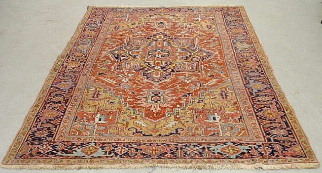 Appraisal: - Room size Heriz carpet with center geometric medallion with