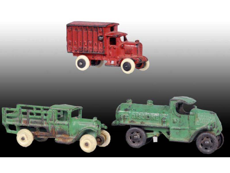 Appraisal: Lot of Small Cast Iron Truck Toys Description All ''