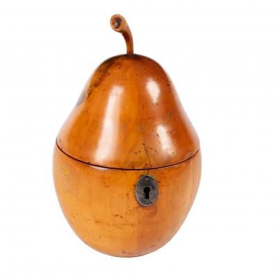 Appraisal: A Georgian fruitwood tea caddy of pear form cm high