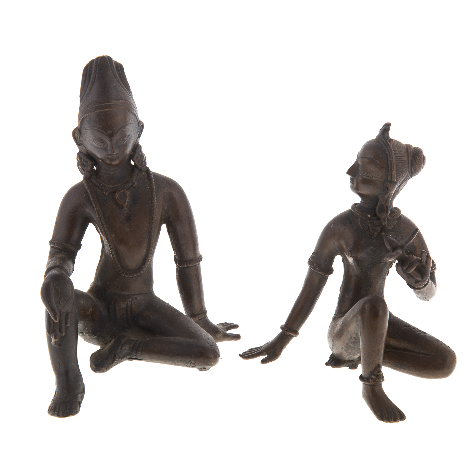 Appraisal: A PAIR INDIAN BRONZE DEITIES th century seated male and