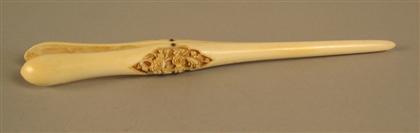 Appraisal: Ivory Glove Stretcher Carved with foliate decoration