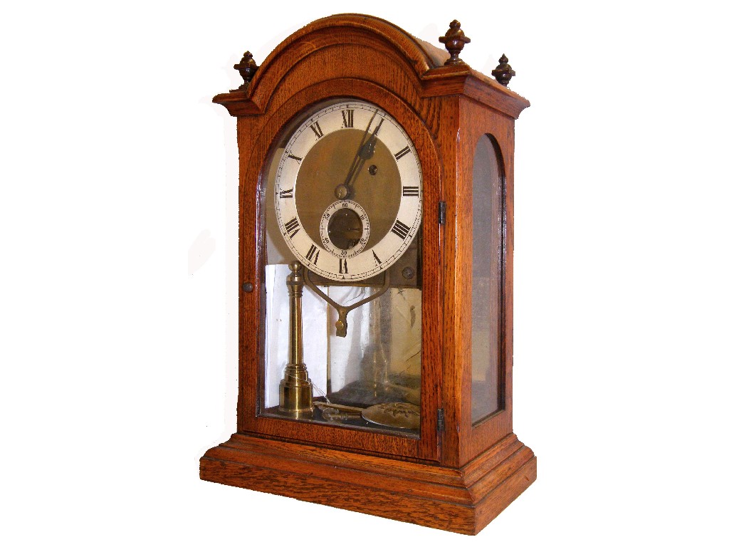 Appraisal: Rare and unusual German oak single fusee bracket clock the