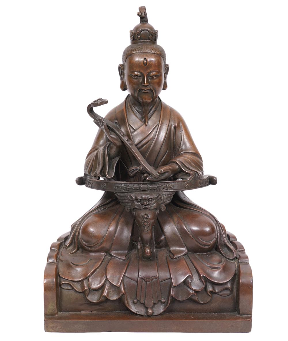 Appraisal: BUDDHA FIGURE OF LINGBAO TIANZUN WITH RUYI SCEPTERBronze seated Daoist