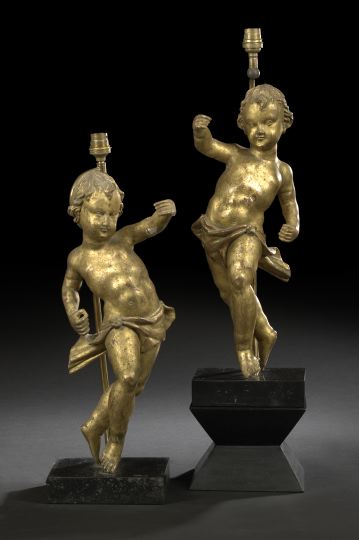 Appraisal: Pair of Italian Giltwood Figures of Prancing Putti late th