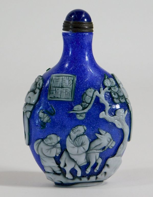 Appraisal: Chinese Blue Snowflake Overlay Snuff Bottle China th Century White