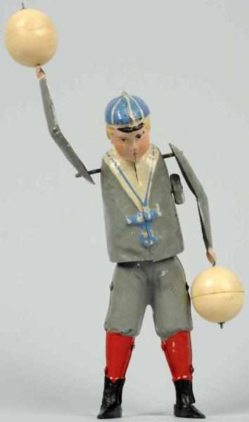 Appraisal: Hand-Painted Tin Ball Playing Boy Wind-Up Toy German Probably made