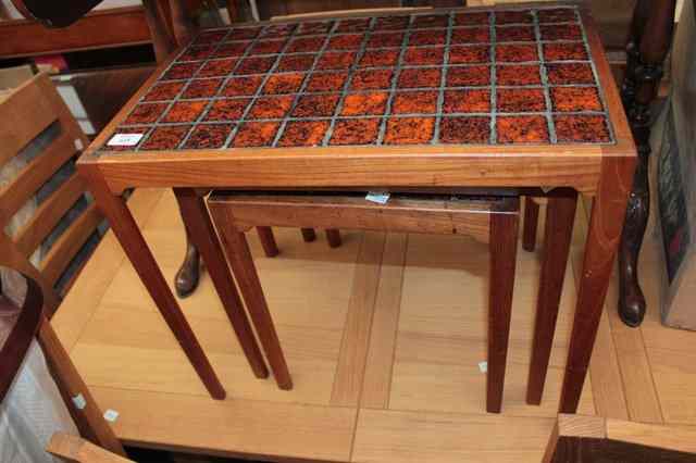 Appraisal: A NEST OF THREE DANISH TEAK TILE SET OCCASIONAL TABLES