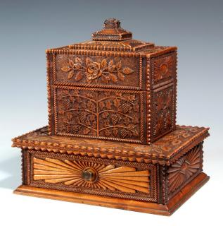 Appraisal: AN ABUNDANTLY CARVED TH C CONTINENTAL WORK BOX A two-tiered