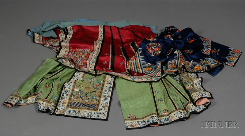 Appraisal: Three Chinese Embroideries th century a dark blue robe with