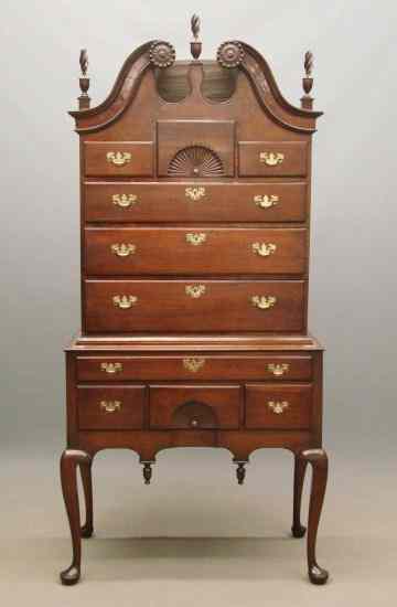 Appraisal: th c New England double fan carved bonnet top highboy