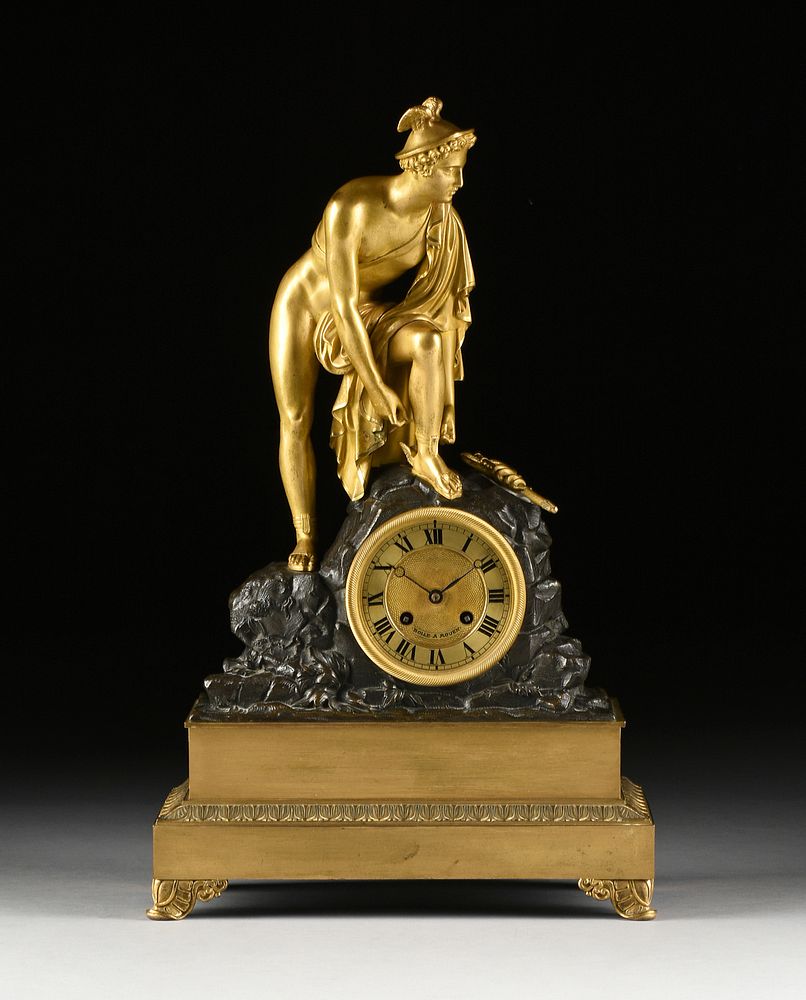 Appraisal: AN EMPIRE GILT AND PATINATED BRONZE MARS MANTLE CLOCK BY