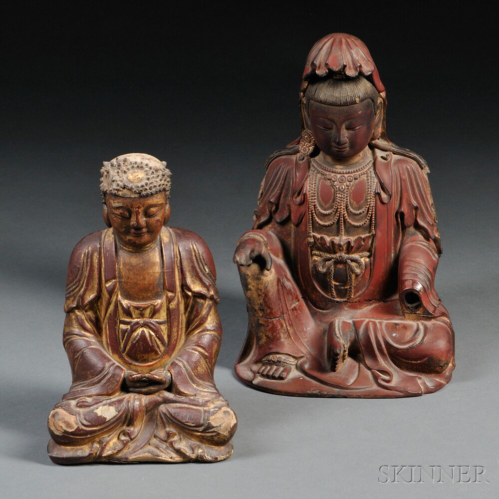 Appraisal: Two Gilt-decorated Lacquer Wood Buddhist Figures China th th century