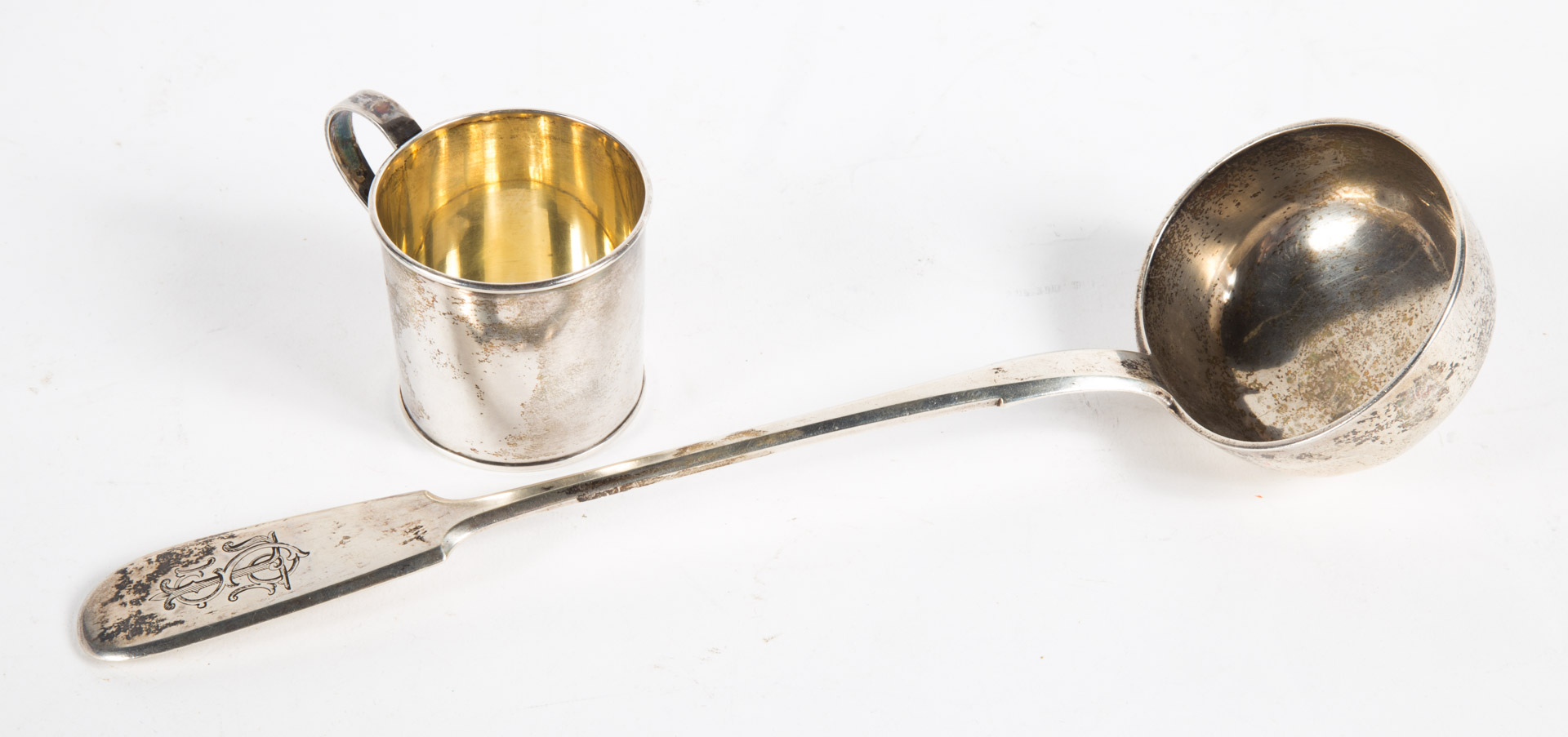 Appraisal: th c Russian silver soup ladle child's cup Russian silver