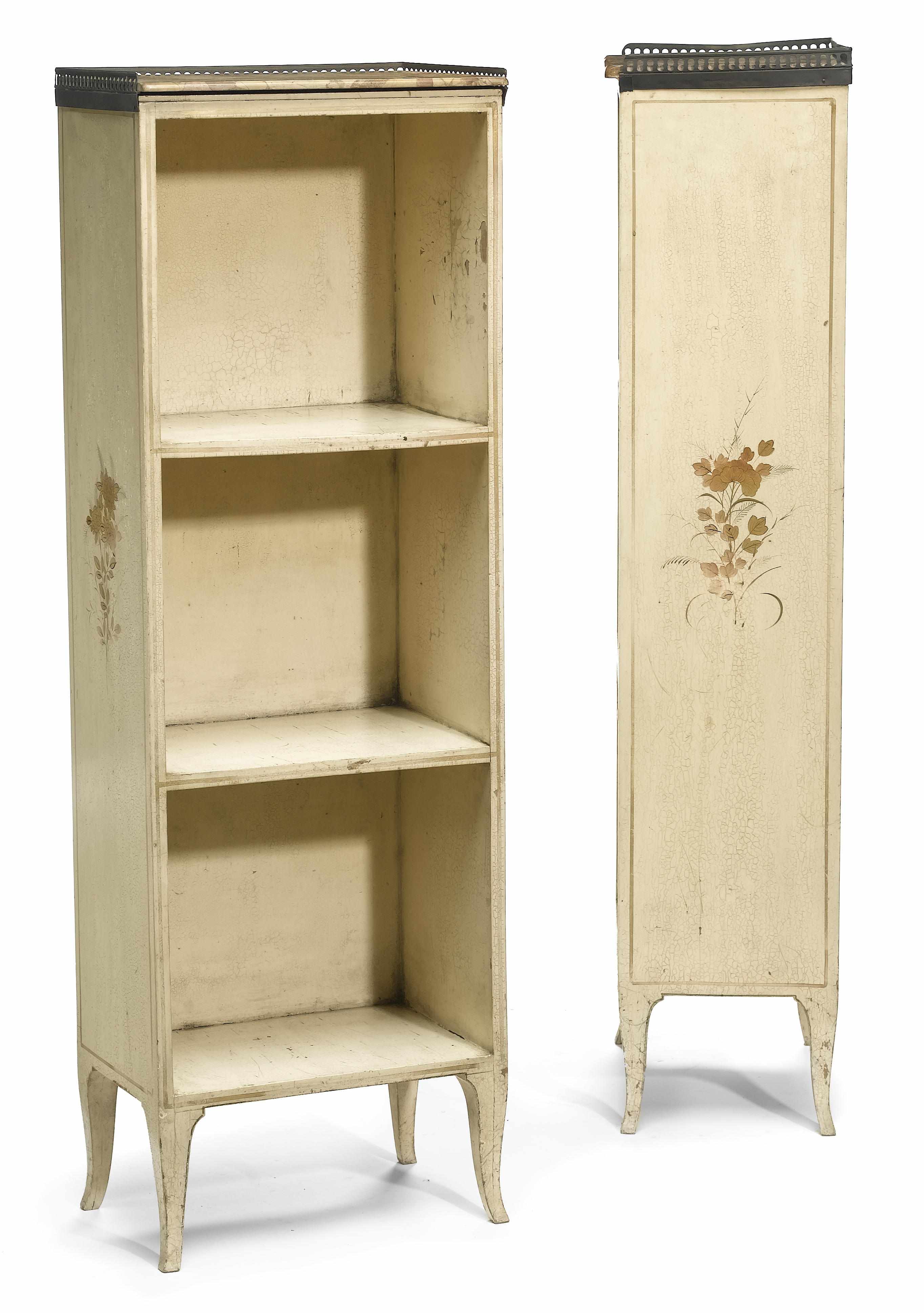 Appraisal: A pair of Neoclassical style cream painted bookcases early th