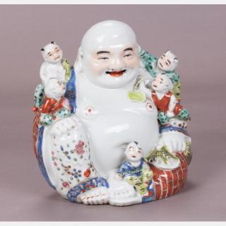 Appraisal: A Chinese Porcelain Figure of Buddha with Five Children th