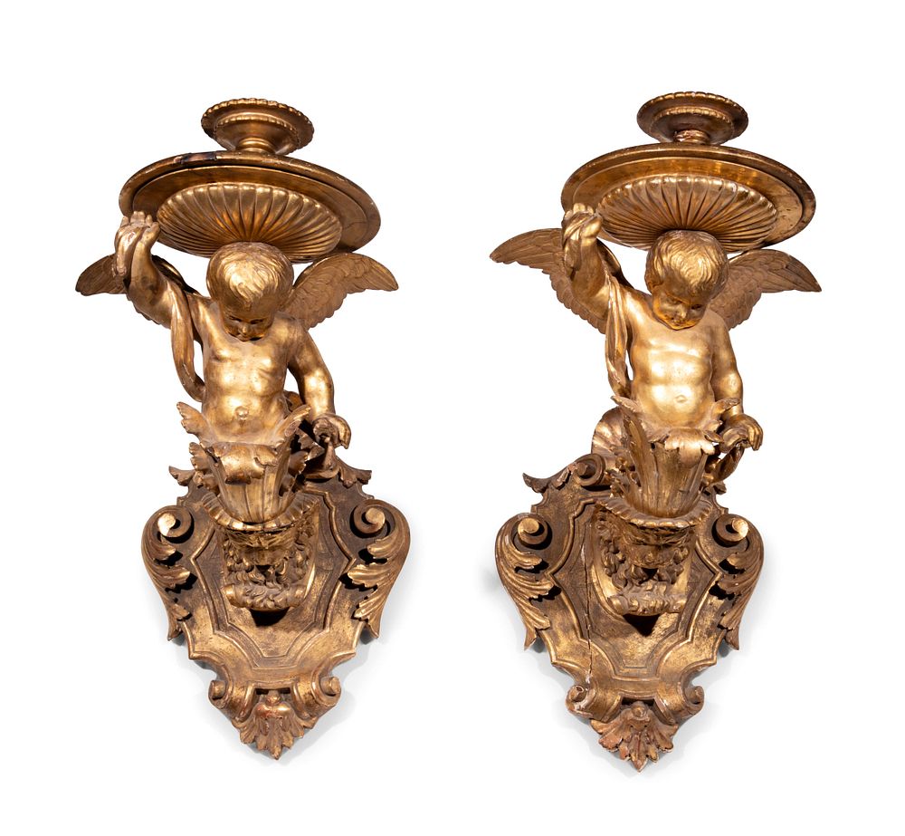 Appraisal: A Pair of Italian Giltwood Figural Wall Brackets A Pair