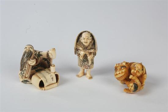 Appraisal: THREE NETSUKES Japanese th century ivory A scholar drinking tea