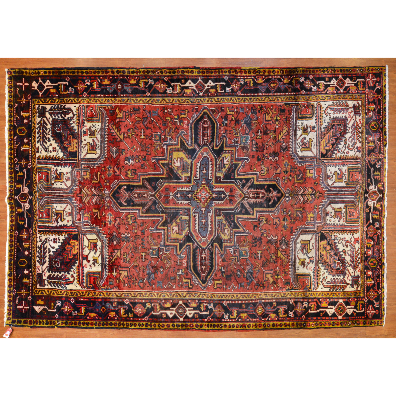 Appraisal: HERIZ RUG PERSIA X Fourth quarter- th century hand-knotted wool