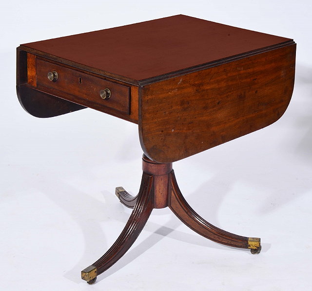 Appraisal: A REGENCY MAHOGANY PEDESTAL PEMBROKE TABLE with drop ends one