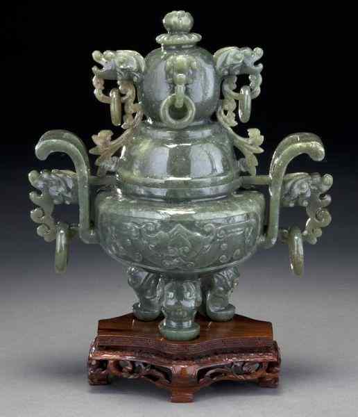 Appraisal: Chinese carved celadon jade tripod censerdepicting bats and dragons with