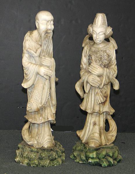 Appraisal: A pair of carved marble Chinese figures mid th century