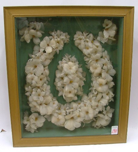 Appraisal: A LATE VICTORIAN WREATH made from white bird feathers with