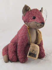 Appraisal: A textile Rufus doorstop by doramouse and company Ht cm