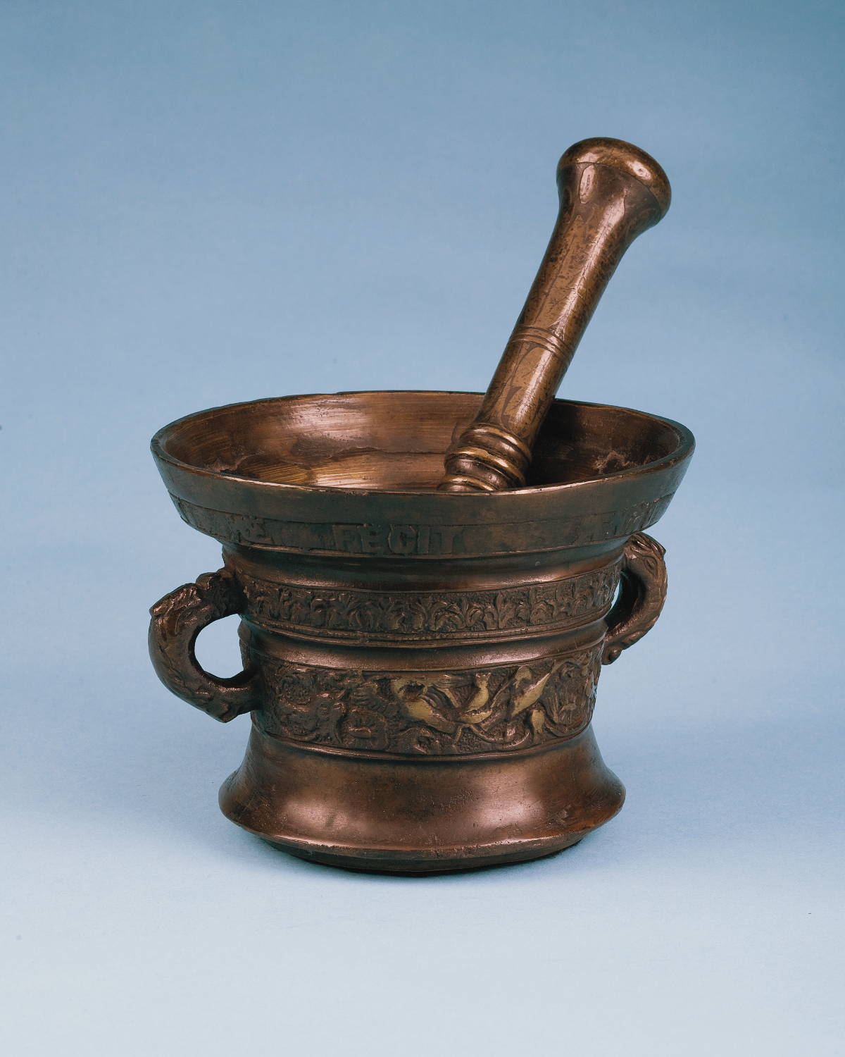 Appraisal: FLEMISH BRONZE MORTAR AND PESTLE Cast with the inscription HEINRICK