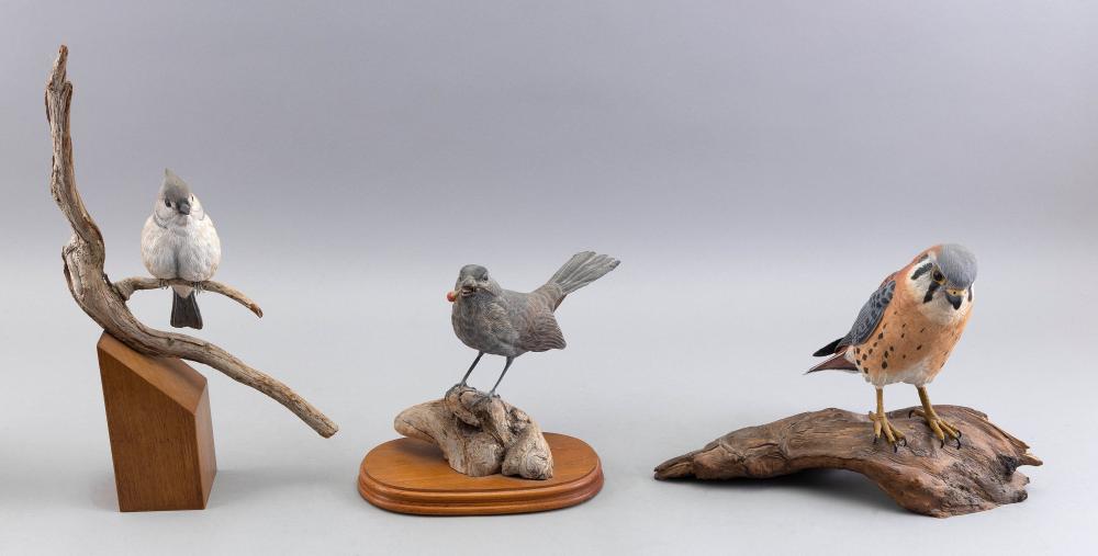 Appraisal: THREE LIFE-SIZE DECORATIVE BIRD CARVINGS LATE TH CENTURY HEIGHTS FROM