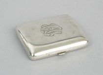 Appraisal: A Sterling Silver Cigarette Case A simple curved sterling silver