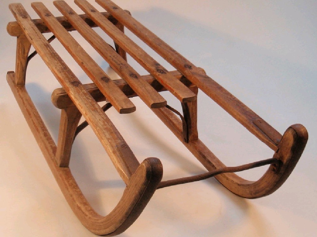 Appraisal: A Davos wooden sledge