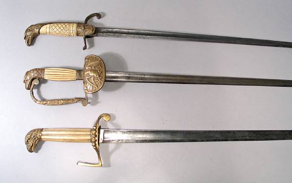 Appraisal: A lot of three American eagle pommel officer's swords Comprising