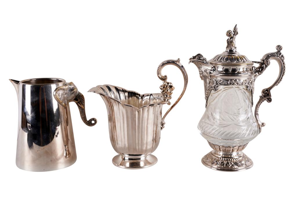 Appraisal: THREE SILVERPLATE PITCHERScomprising one with glass body unmarked inches high