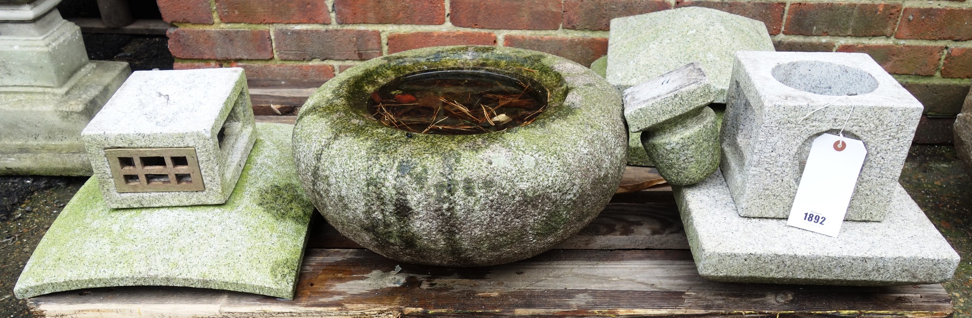 Appraisal: Two Japanese carved granite lanterns each approximately cm high together