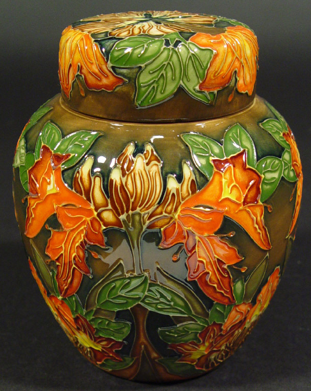 Appraisal: Moorcroft pottery ginger jar and cover hand painted and tubelined