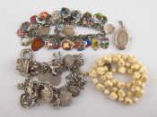 Appraisal: A mixed lot comprising two charm bracelets many charms marked