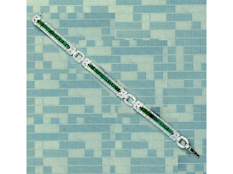 Appraisal: DIAMOND AND EMERALD BRACELET k white gold bracelet with fifty-two