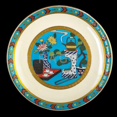 Appraisal: MINTON Enamel-decorated porcelain plate with Asian tea scene England Marked