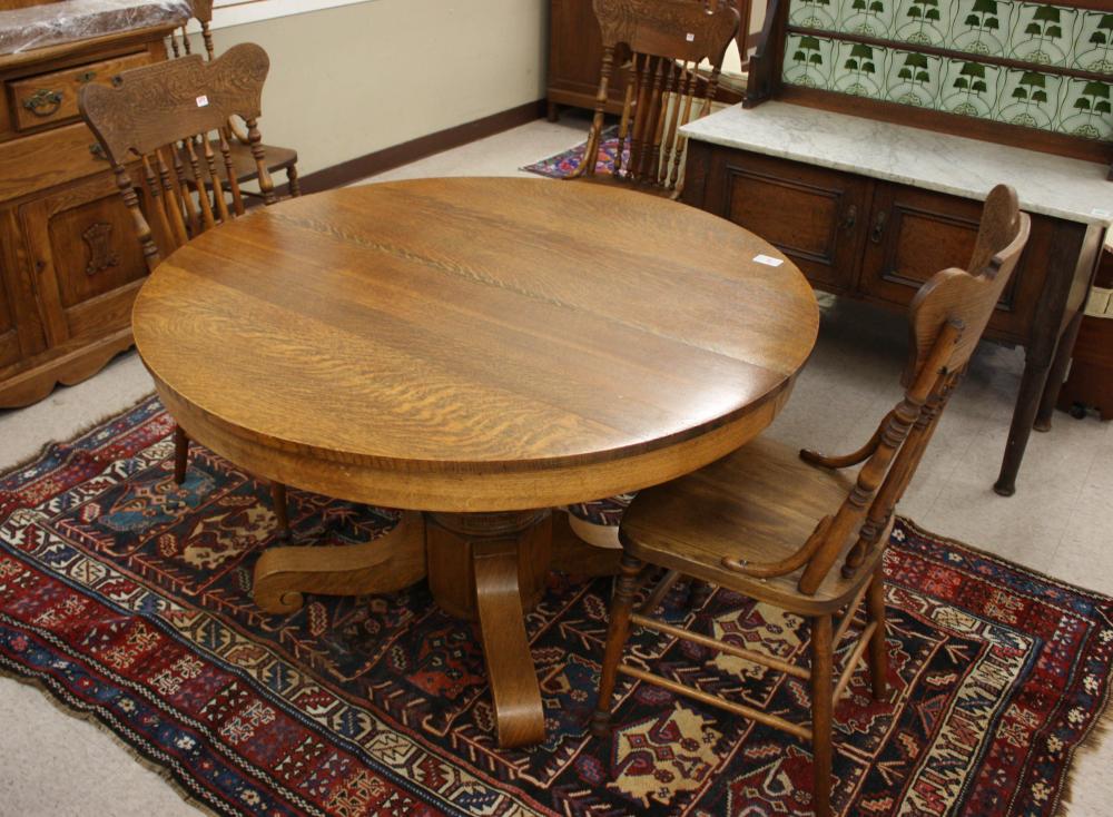 Appraisal: ROUND OAK PEDESTAL DINING TABLE FIVE CHAIRS THREE LEAVES GROUP