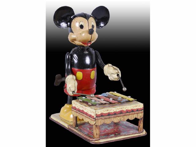 Appraisal: Lot of Disney Linemar Mickey Minnie Toys Description Tin Wind-up