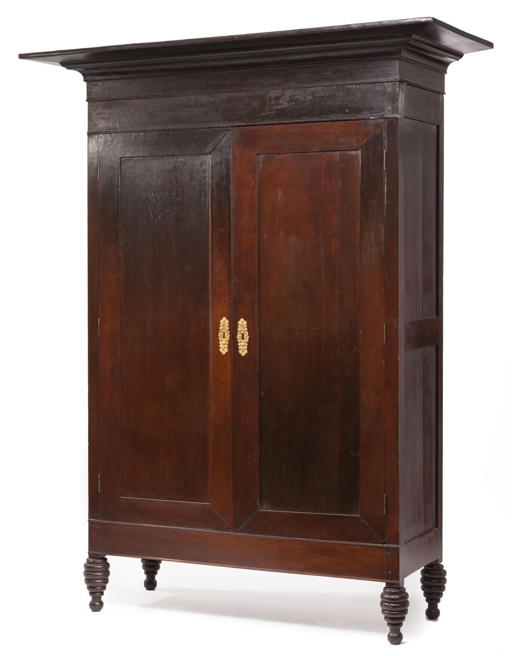 Appraisal: Louisiana Cherrywood Armoire early th c boldly flared cove cornice